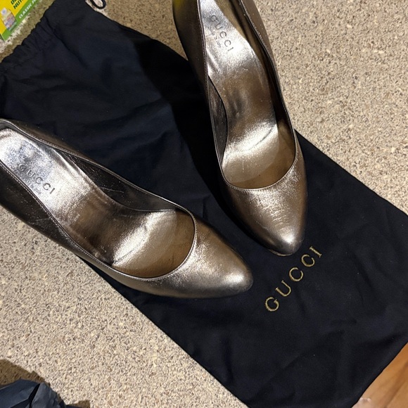 Gucci Shoes - Gucci Metallic Black/Gold Heels